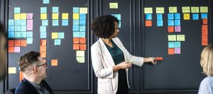 A female business analyst leading a planning session