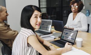 Happy employees collaborating in an office